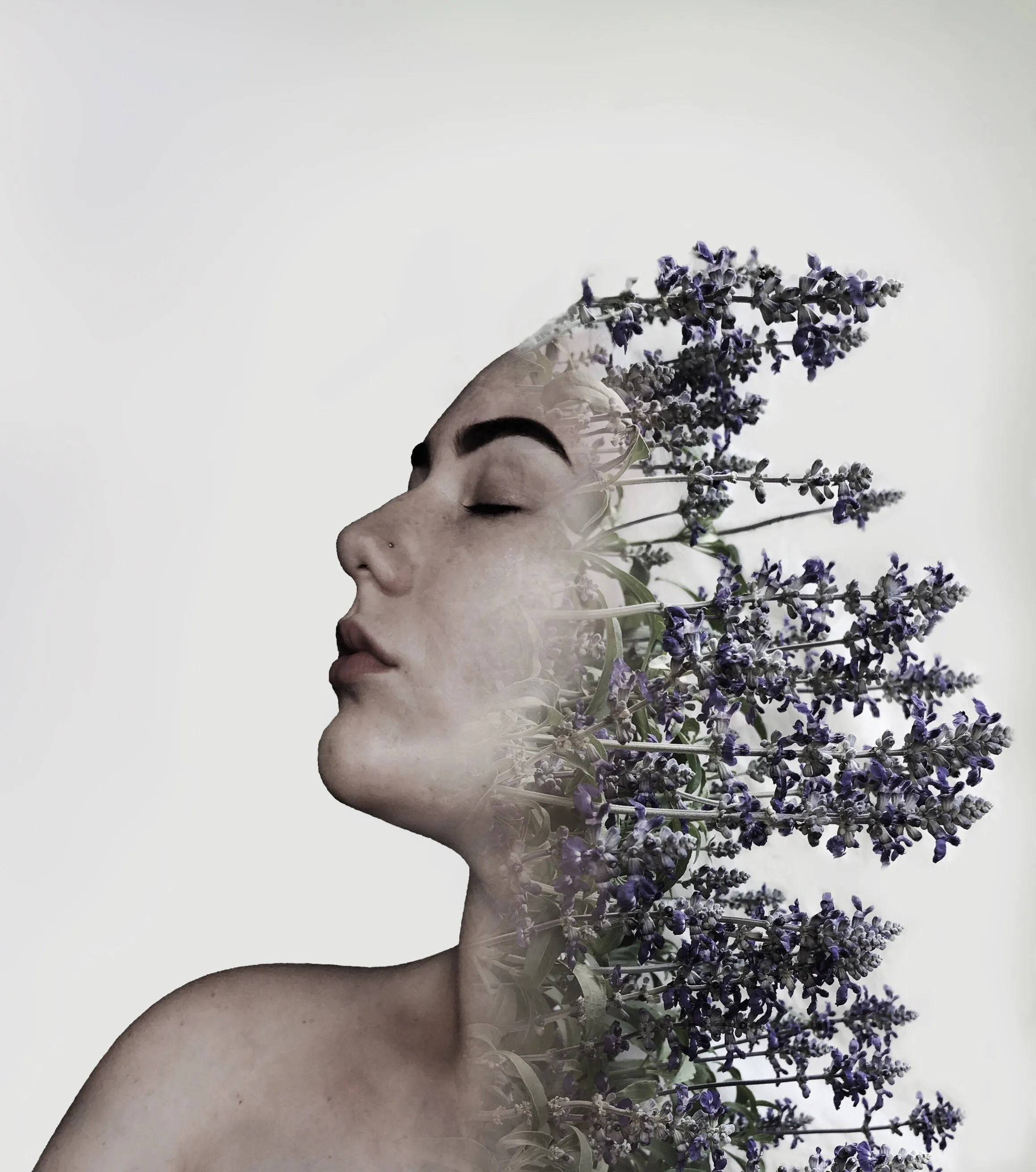 Profile portrait blended with flowering tree branches