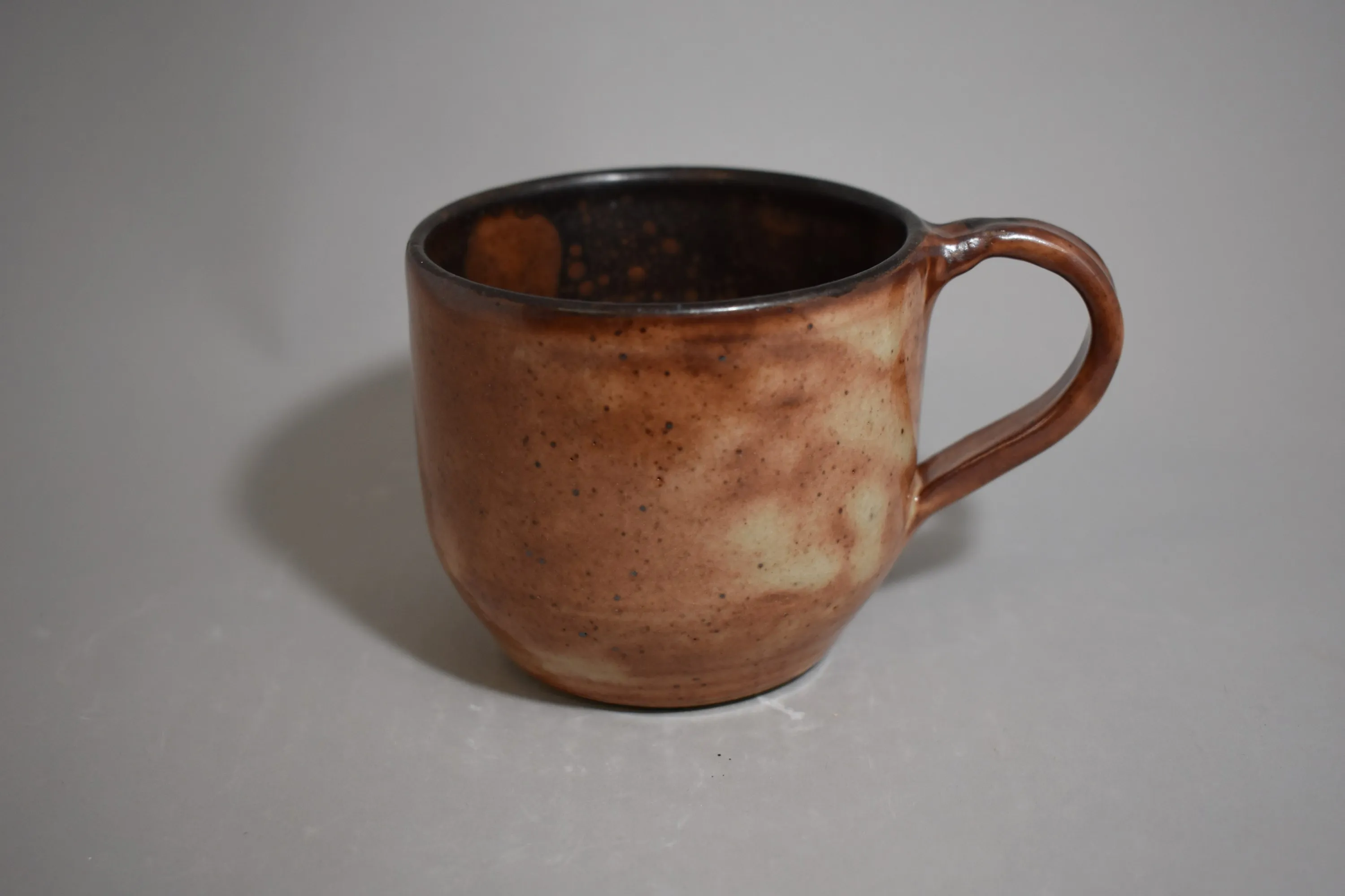Handmade ceramic vessel with layered glaze — view 12