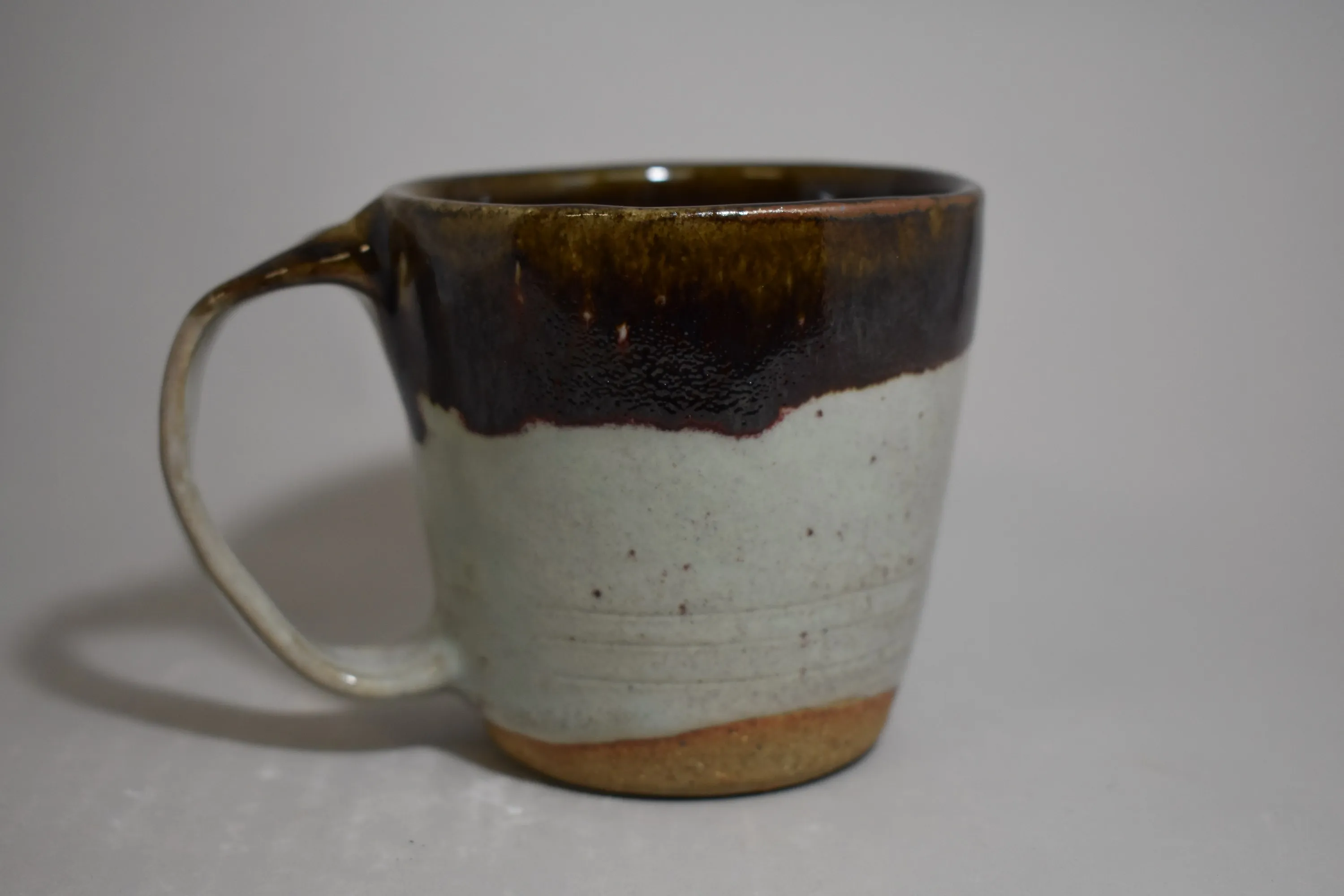 Handmade ceramic vessel with layered glaze — view 13