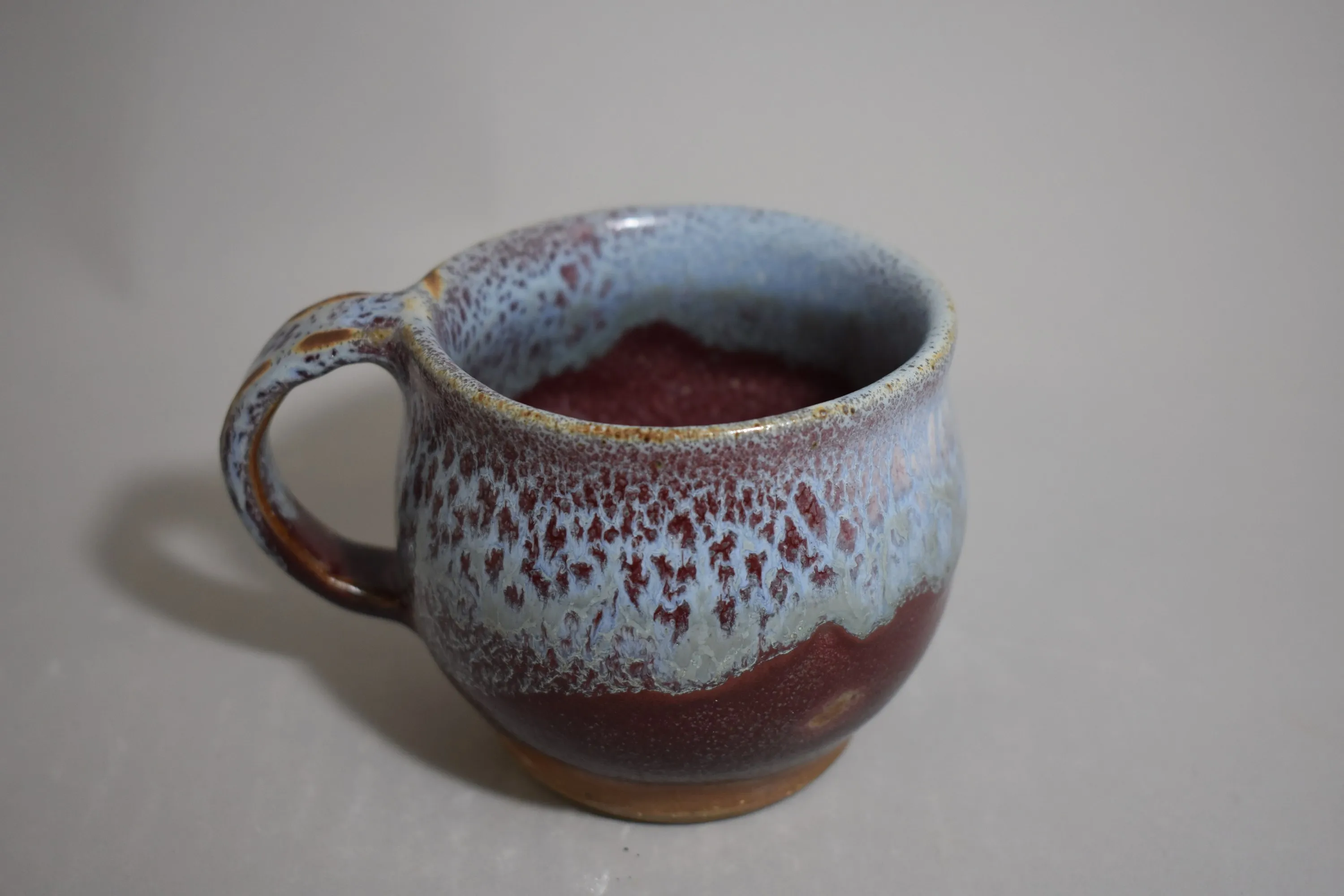 Handmade ceramic vessel with layered glaze — view 17