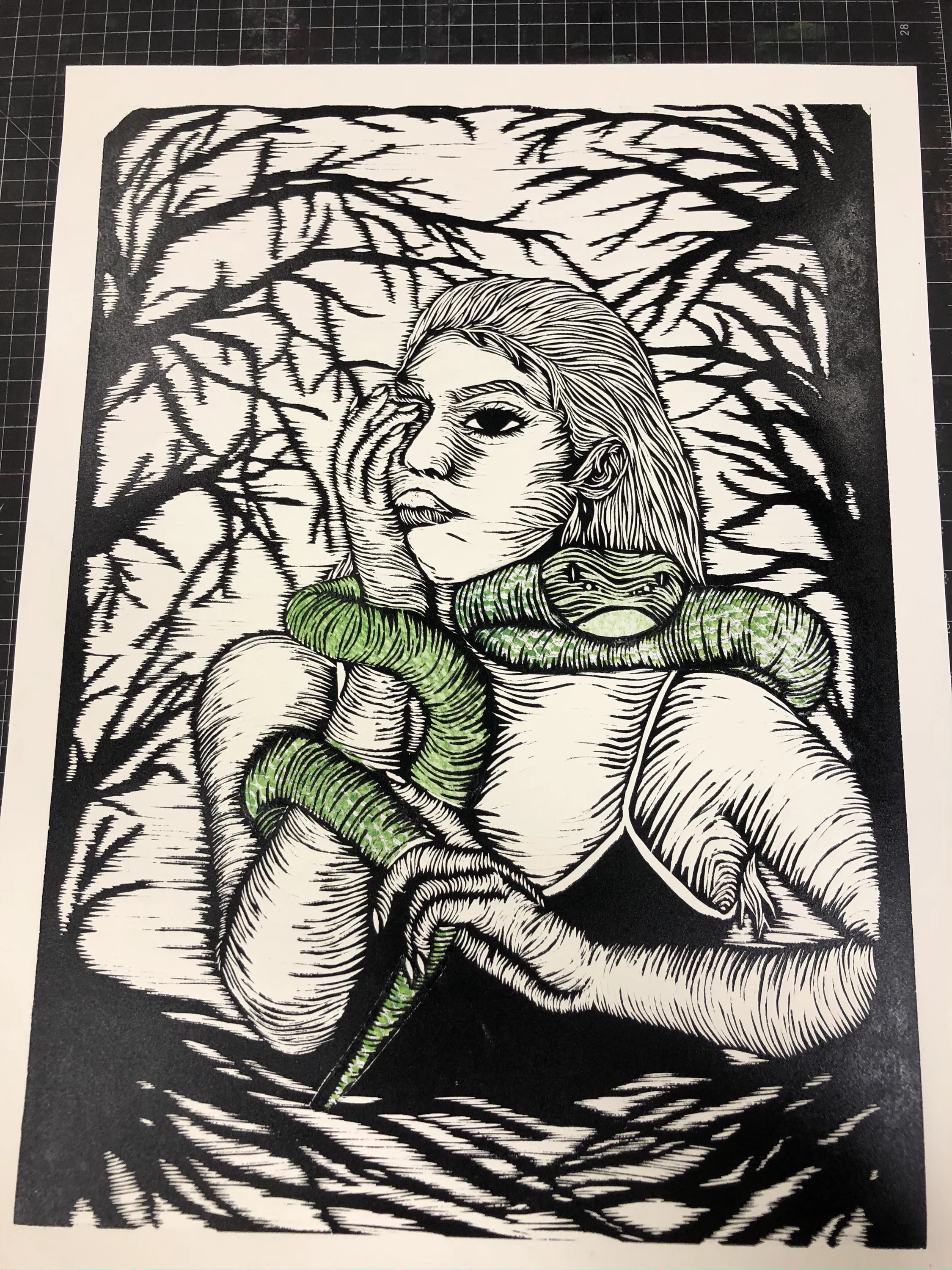 Black-and-white print of a woman surrounded by plants