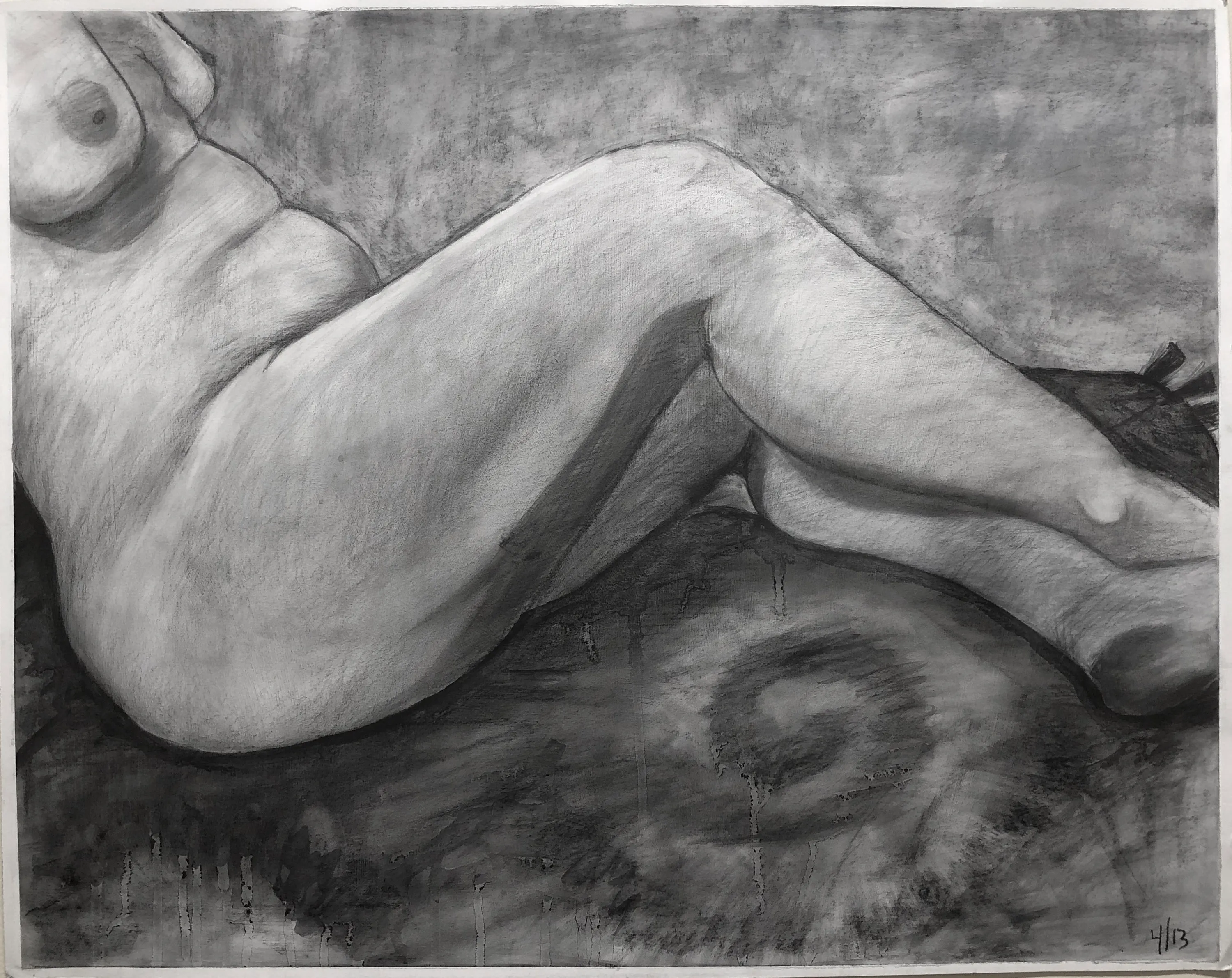 Charcoal figure study of a reclining person
